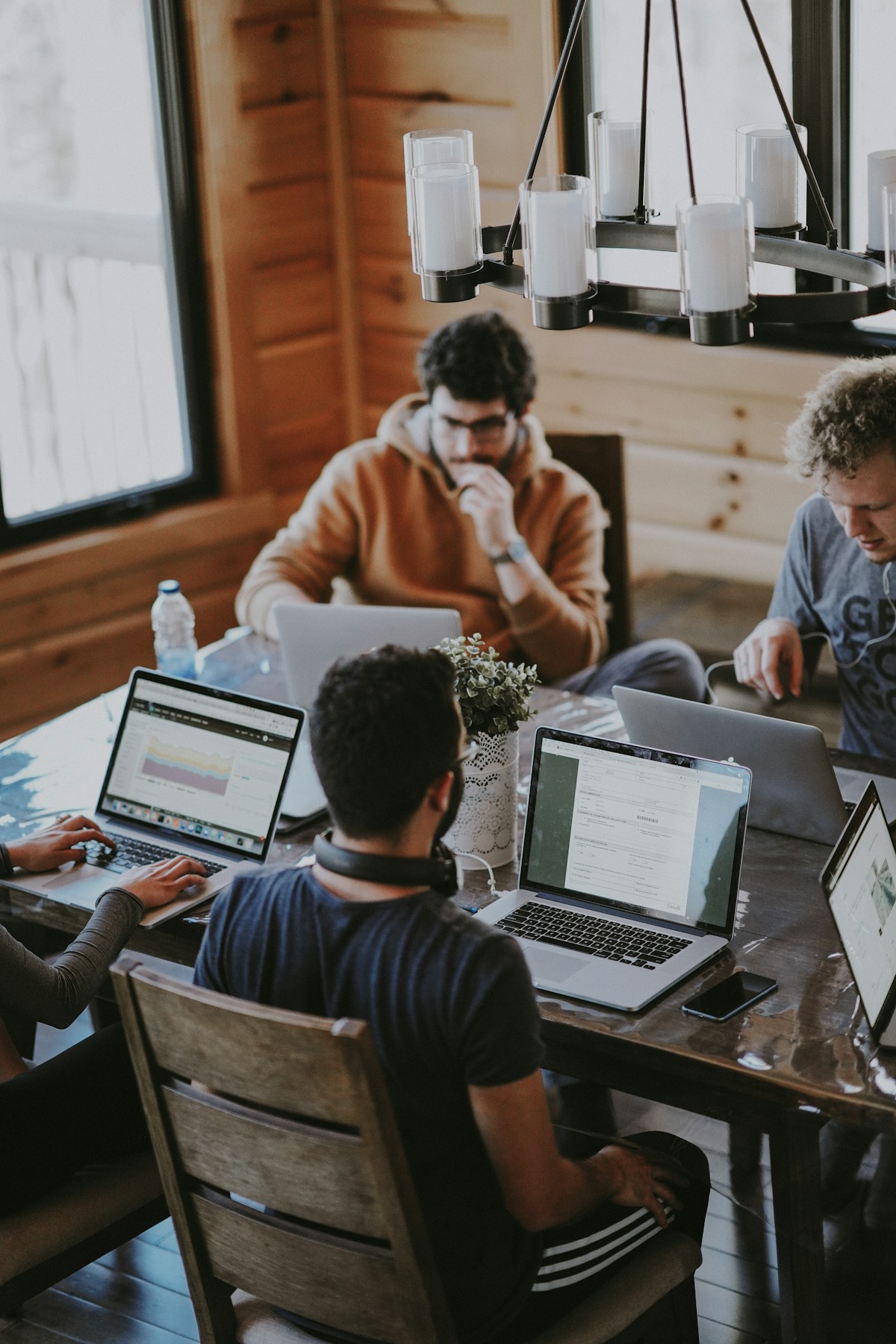 A team standing together in a contemporary workspace.